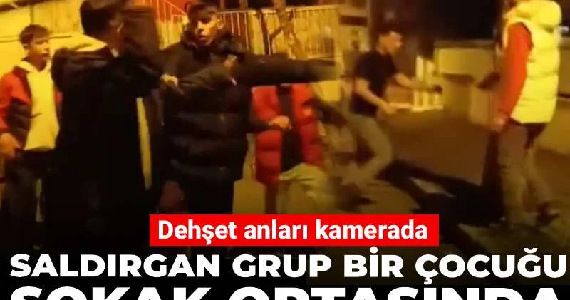 Saldırgan grup bir çocuğu sokak ortasında kemer ve sopalarla darbetti! Dehşet anları kamerada