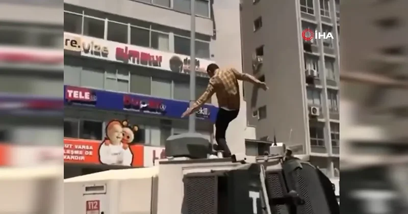 İzmir mitingi öncesi TOMA nın üzerine çıkmıştı! Gözaltına alındı