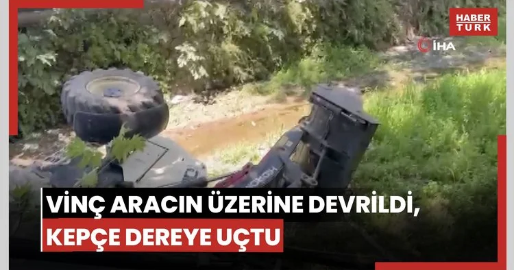 Vinç aracın üzerine devrildi, kepçe dereye uçtu: Korku dolu anlar kamerada