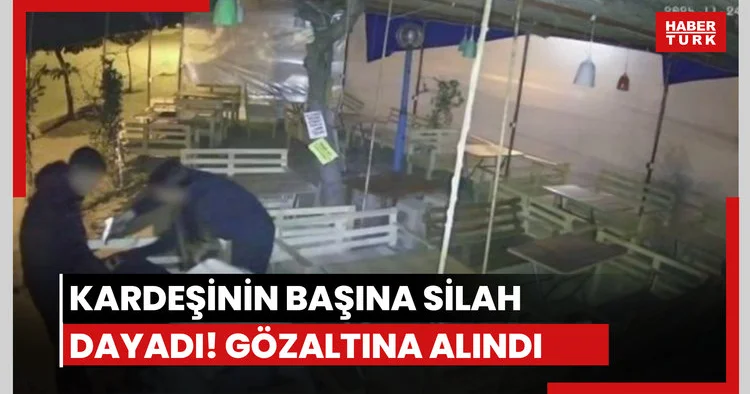 Kardeşinin başına silah dayadı