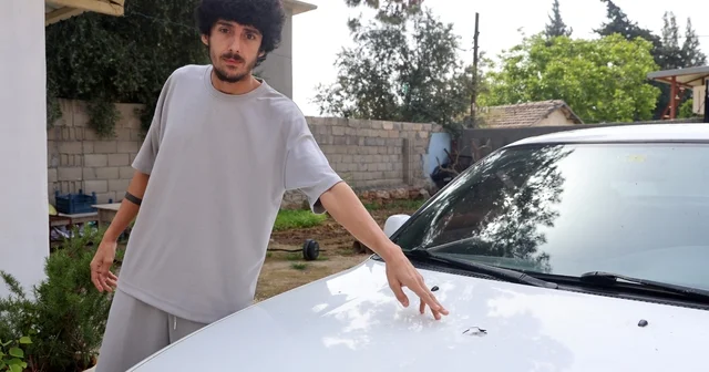 Sesle panik ve korku yaşayan vatandaşın aracına yorgun mermi isabet etti Hatay Haberleri