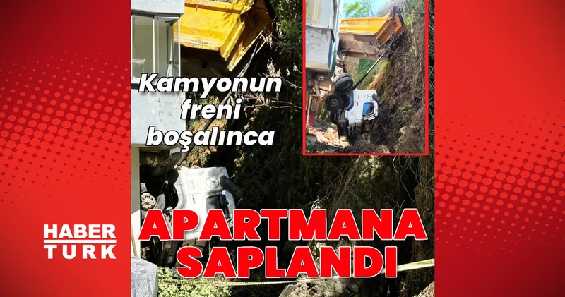 Freni boşalan kamyon apartman ile duvar arasına girdi: 2 daire zarar gördü