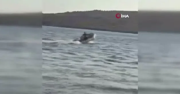 Ayvalık ta can pazarı: Akıntıya kapılan tatilciyi botla kurtardı!