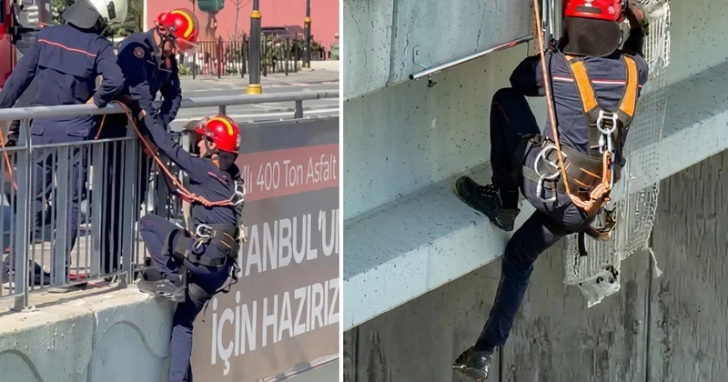 İtfaiye eri, Arnavutköy de köprüdeki panoda mahsur kalan yavru kediyi kurtardı