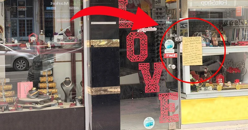Cam silmekten yorulan esnafın eşi çareyi vitrine not asmakta buldu