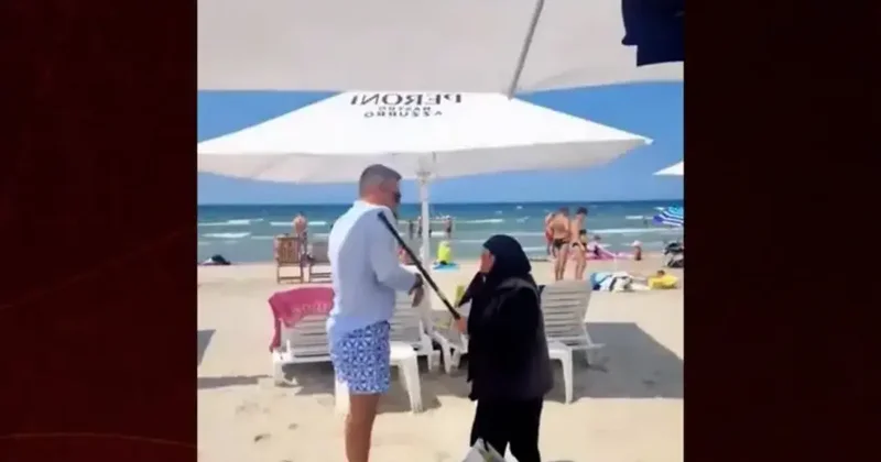 Plajda yaşlı teyzenin bastonuyla görevliyi kovaladığı anlar gündem oldu