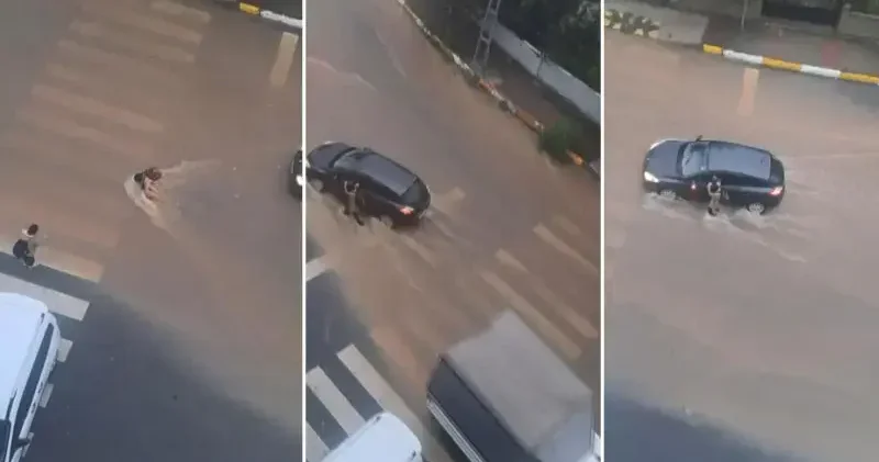 Sultanbeyli’de yağmur suyunda sürüklenerek yere düşen çocuğa sürücü yardım etti