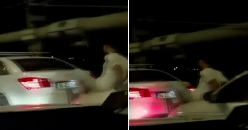 15 Temmuz Şehitler Köprüsü’nde ilginç görüntü: Aracın kaputuna oturdu, önündeki arabayı ayağıyla itti