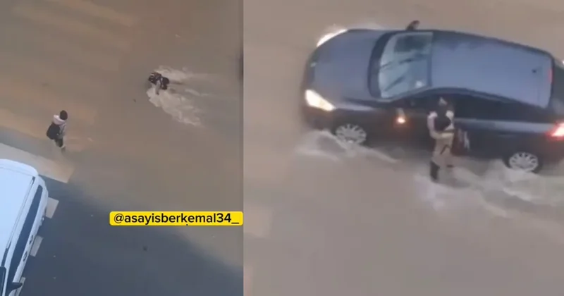 Yağmurda düşen çocuğa, aracından inmeden yardım etti!