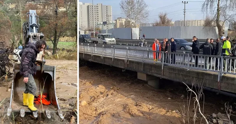 Selde mahsur kalan vatandaş kepçeyle kurtarıldı