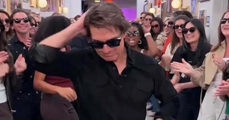 Televizyon çalışanları şarkı söyledi, Tom Cruise dans etti
