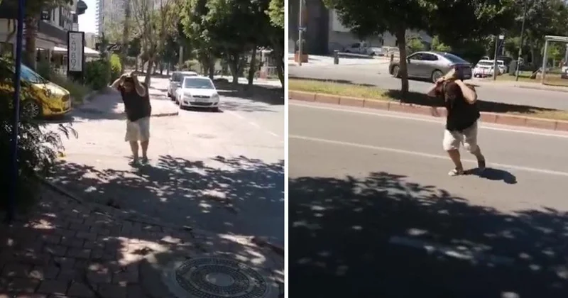 Yolda yürürken kargaların saldırısına uğradı, ne yapsa kurtulamadı