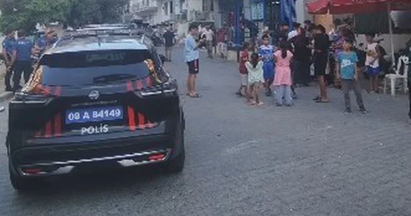 Kuşadası nda Sokak Ortasında Silahlı Saldırı: 1 Yaralı, 14 Yaşındaki Kız Çocuğu da Vuruldu
